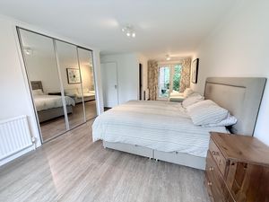 Bedroom One- click for photo gallery